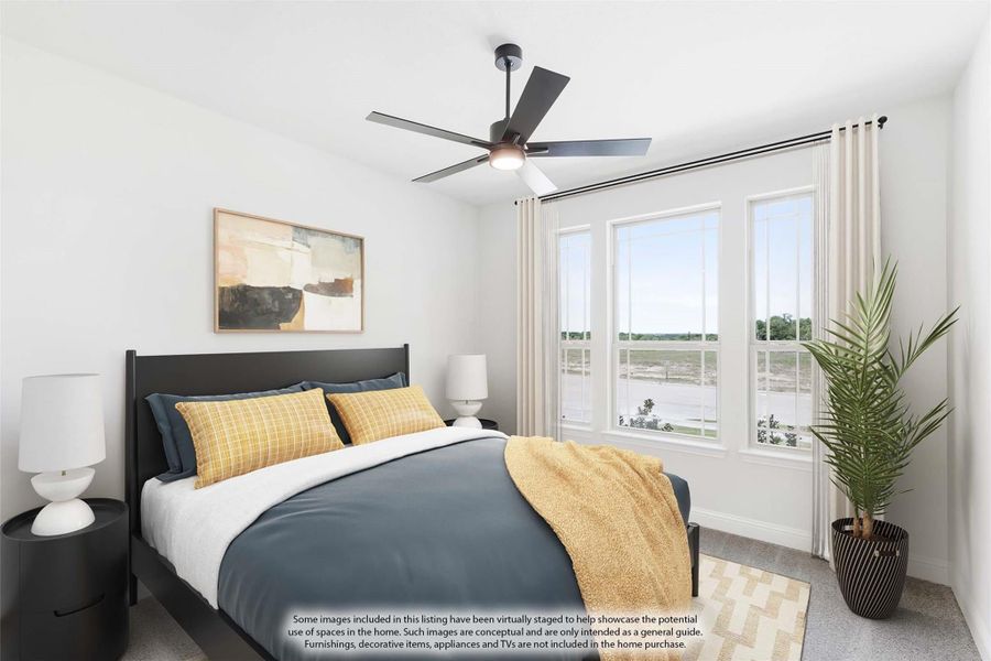 Bedroom with dark wood bed frame, ceiling fan, and large windows with natural light Bedroom with dark wood bed frame, ceiling fan, and large windows with natural light