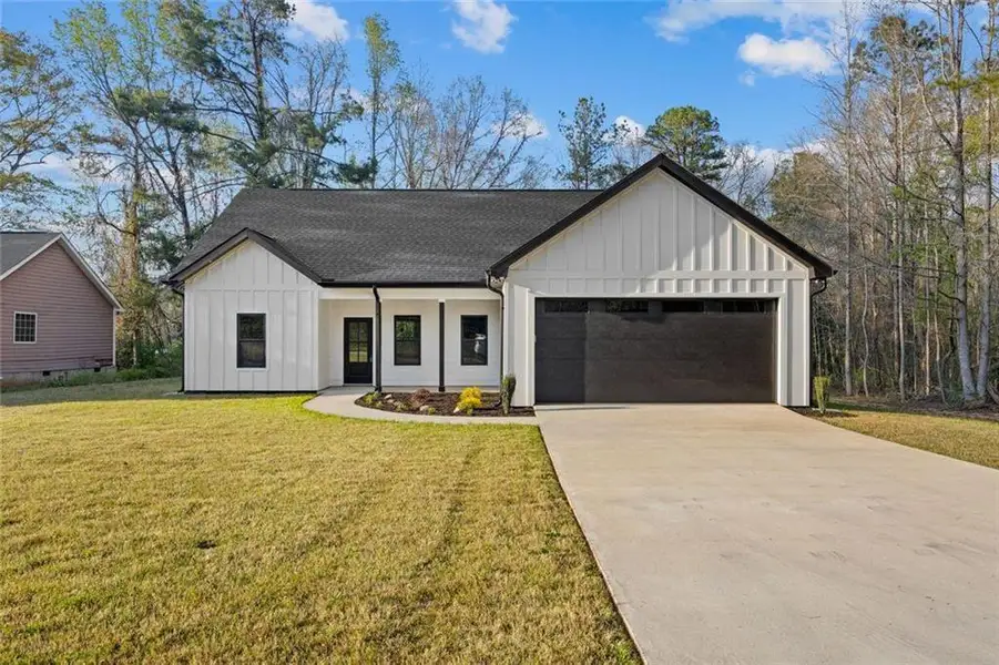 Front exterior of a new home in , LaGrange, GA, highlighting curb appeal (Image 1). Front exterior of a new home in , LaGrange, GA, highlighting curb appeal (Image 1).