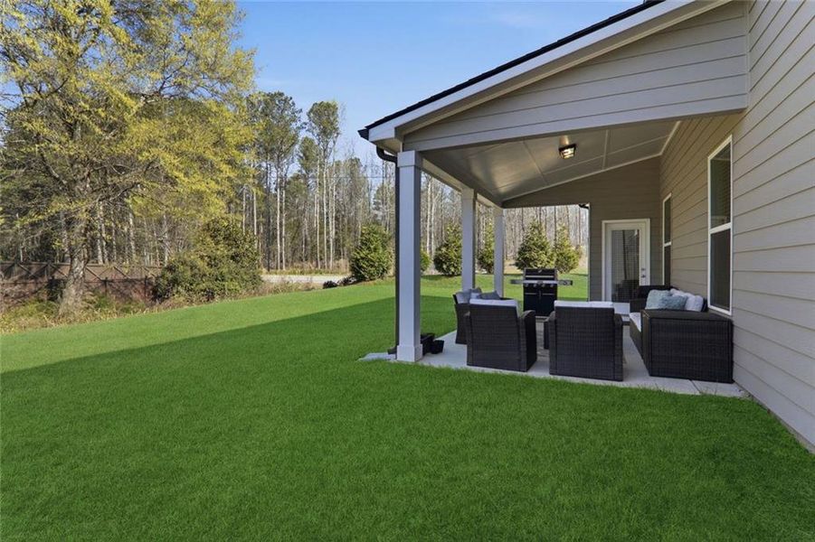 Exterior details and patio area of a home in Rosewood Lake Estates, Hoschton (Image 38). Exterior details and patio area of a home in Rosewood Lake Estates, Hoschton (Image 38).