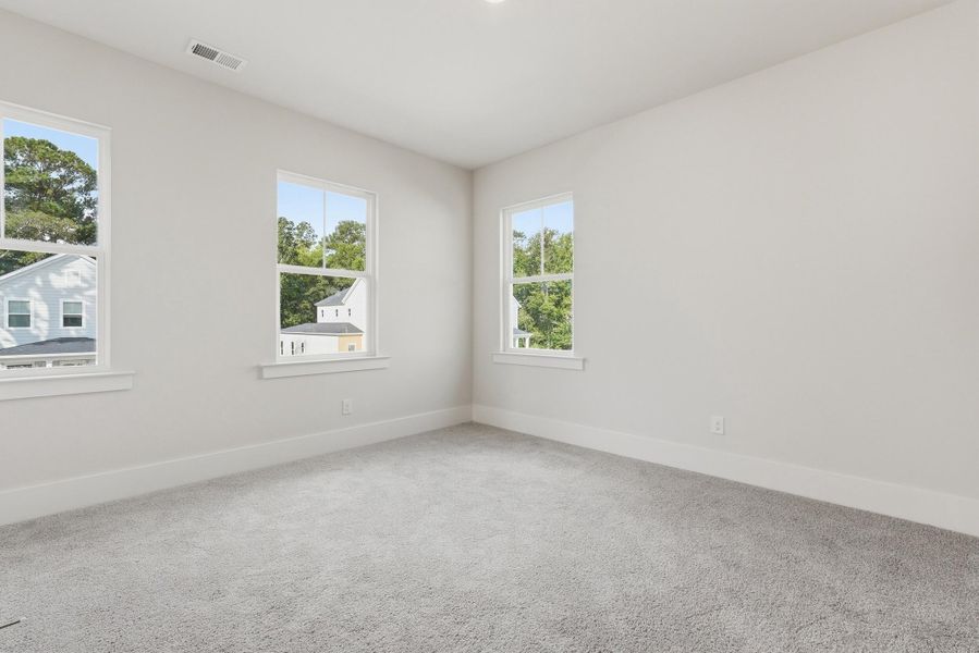 Spacious, unfurnished interior of a new home in Indigo Grove Single Family Homes, Johns Island (Image 23).