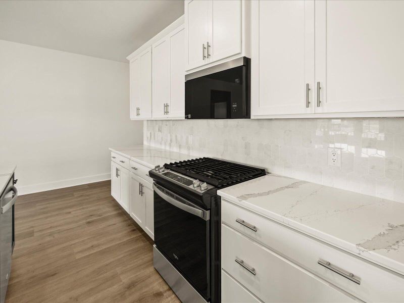 Furnished interior view inside a new home in The Coves at Lakes of Cane Bay, Summerville (Image 9).