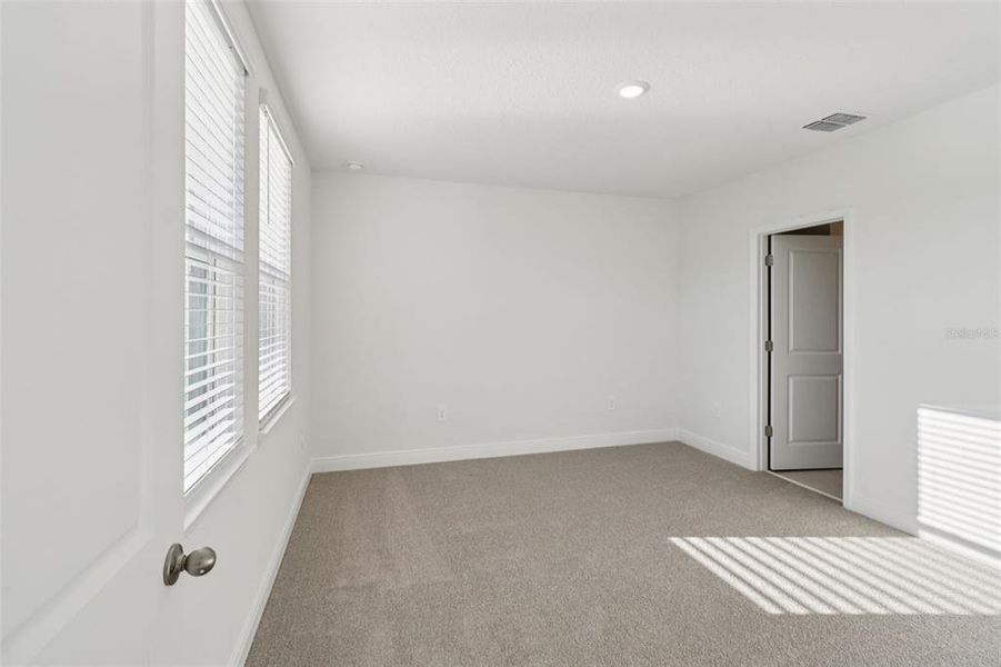 Spacious, unfurnished interior of a new home in The Reserve at Hammock Oaks - Classic Series, Lady Lake (Image 16). Spacious, unfurnished interior of a new home in The Reserve at Hammock Oaks - Classic Series, Lady Lake (Image 16).