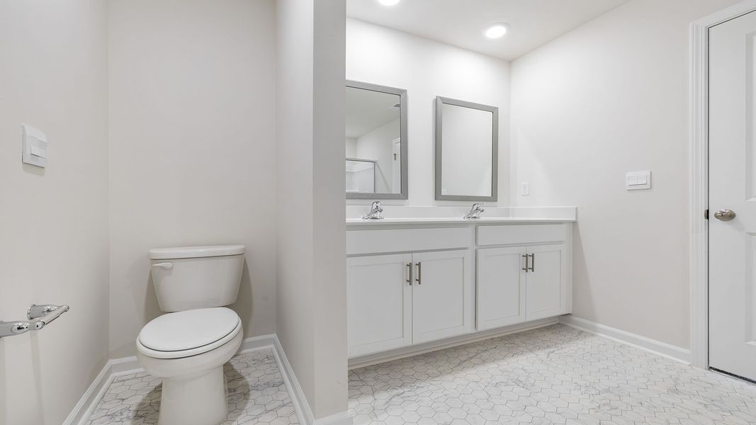 Furnished interior view inside a new home in Tanglewood Townes, Greenville (Image 14).
