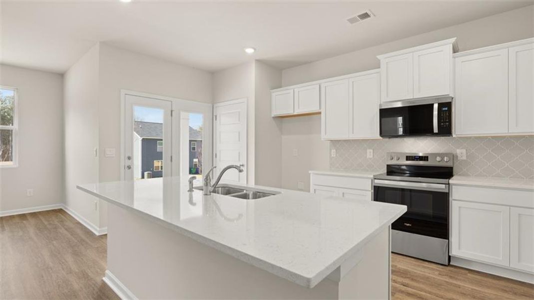 Furnished interior view inside a new home in Willowbrook, Winder (Image 6).
