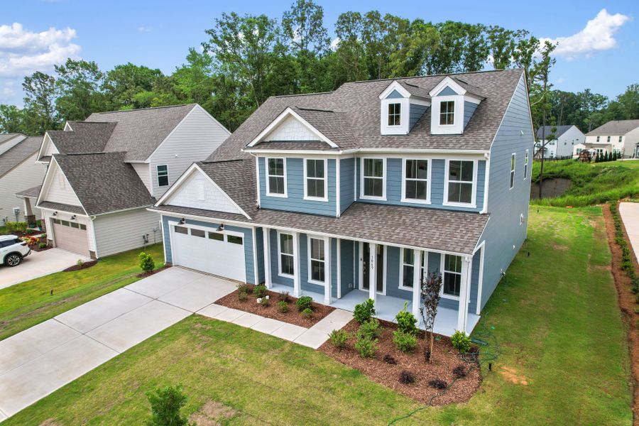 Front exterior of a new home in Kinsdale, Lancaster, SC, highlighting curb appeal (Image 1). Front exterior of a new home in Kinsdale, Lancaster, SC, highlighting curb appeal (Image 1).