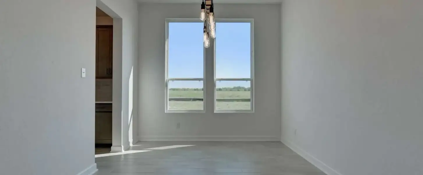 Representative unfurnished interior of a home built from the Kerrville by Ashton Woods in Saddlebrook Ranch, Schertz (Image 20).