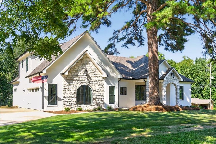 Front exterior of a new home in , Dallas, GA, highlighting curb appeal (Image 24). Front exterior of a new home in , Dallas, GA, highlighting curb appeal (Image 24).