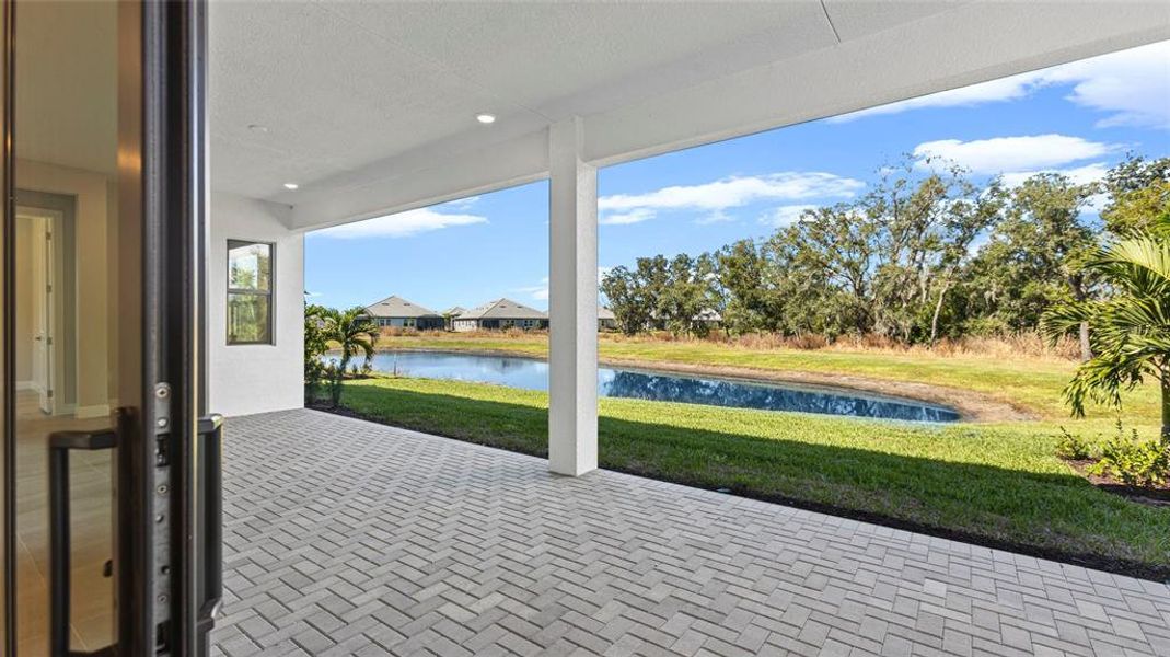 Exterior details and patio area of a home in Cresswind Lakewood Ranch, Lakewood Ranch (Image 4).