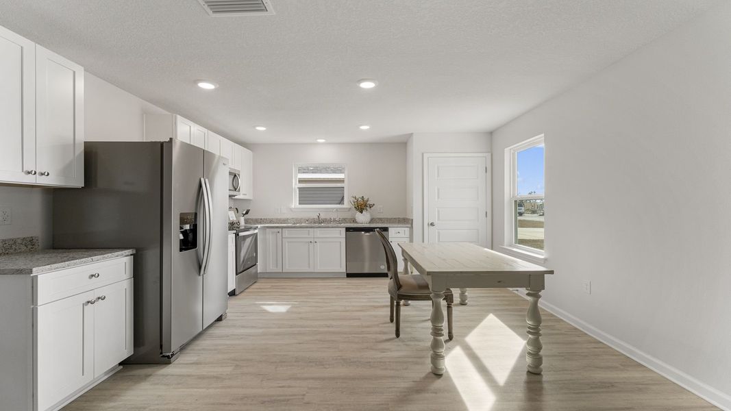 Representative furnished interior of a home built from the Callaway by D.R. Horton in Sunny Hills, Chipley (Image 9).