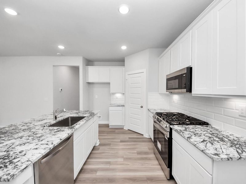 Furnished interior view inside a new home in Windmill Estates, Magnolia (Image 9).