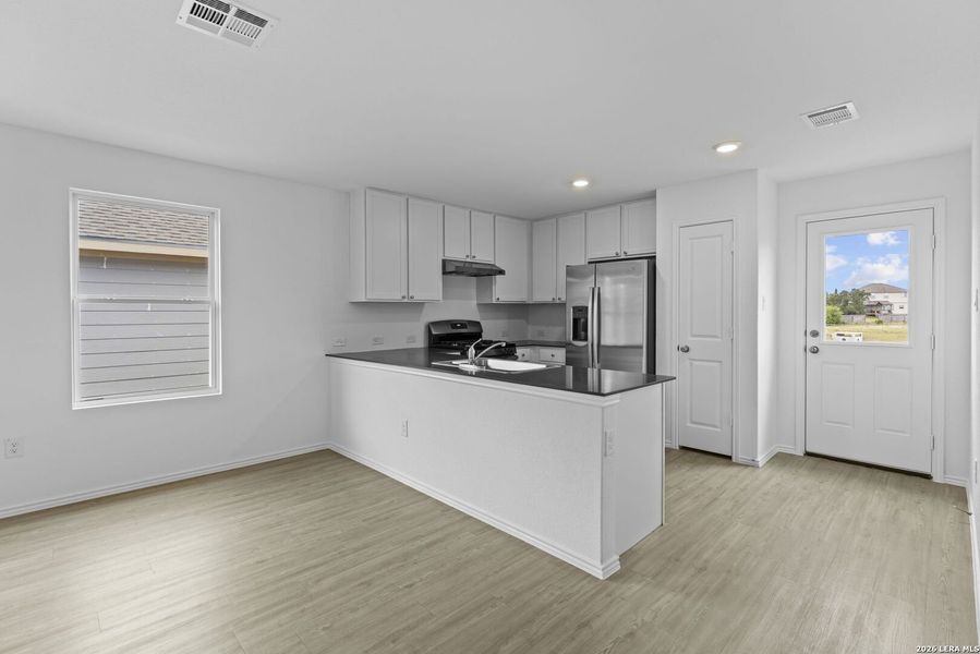 Furnished interior view inside a new home in , San Antonio (Image 6).