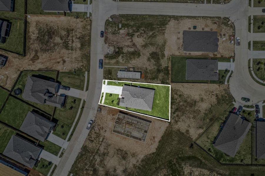 Amazing aerial shot of this gorgeous DR Horton home situated on a quiet street in the sought after community of Lago Mar, zoned to Dickinson ISD. Lush landscaping, well manicured front lawn and a wonderful back patio setup.