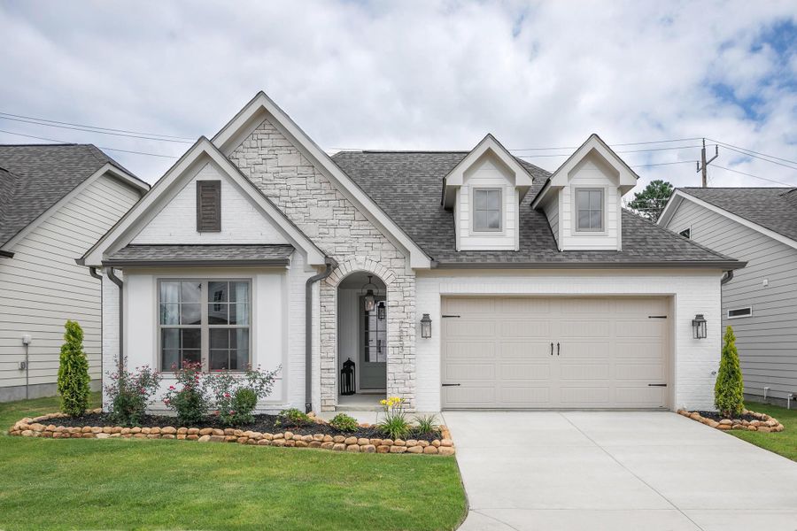 Front exterior of a new home in Timberlee, Ooltewah, TN, highlighting curb appeal (Image 1). Front exterior of a new home in Timberlee, Ooltewah, TN, highlighting curb appeal (Image 1).