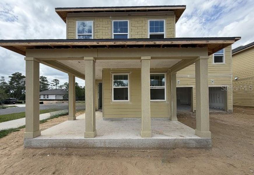 Exterior details and patio area of a home in Northlake at Ovation, Winter Garden (Image 3).