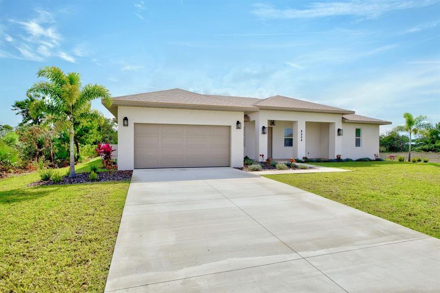 Front exterior of a new home in , Sebring, FL, highlighting curb appeal (Image 1).
