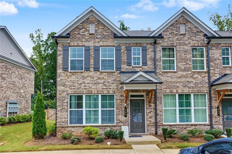 Front exterior of a new home in , Lawrenceville, GA, highlighting curb appeal (Image 22).
