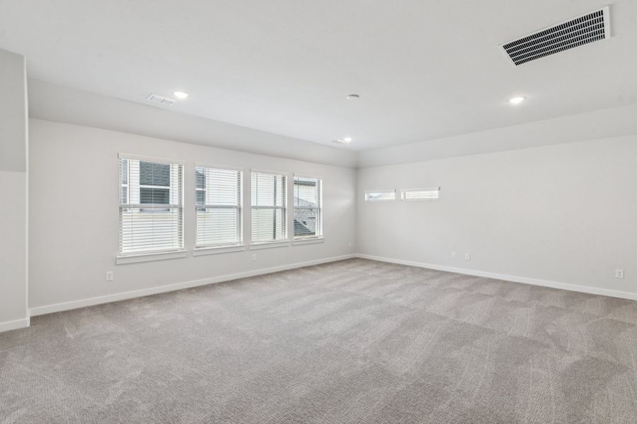 Game Room in the Mercury home plan by Trophy Signature Homes – REPRESENTATIVE PHOTO Game Room in the Mercury home plan by Trophy Signature Homes – REPRESENTATIVE PHOTO