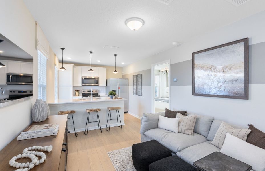 Representative furnished interior of a home built from the Mabel II by Pulte Homes in EverBe, Orlando (Image 8).