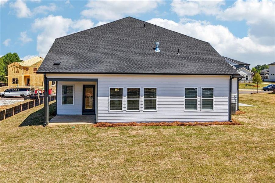 Exterior details and patio area of a home in River Pointe, Monroe (Image 4).