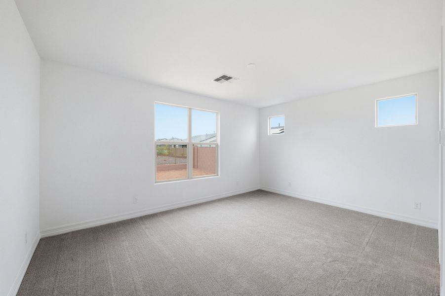 Spacious, unfurnished interior of a new home in Artisan at Asante, Surprise (Image 21).