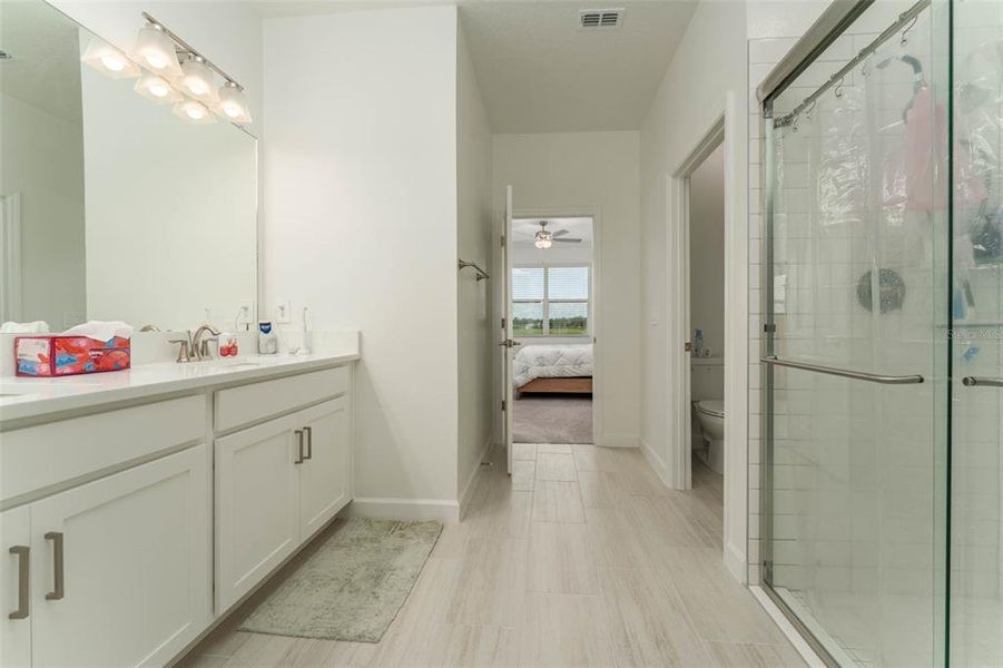 Furnished interior view inside a new home in Prosperity Lakes Active Adult, Parrish (Image 36).