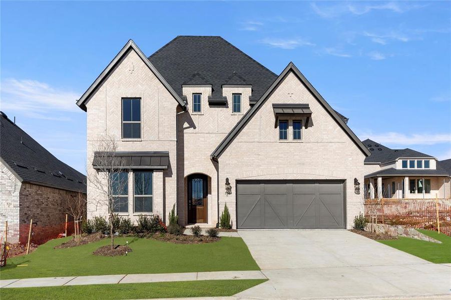 Front exterior of a new home in Hillside Village, Celina, TX, highlighting curb appeal (Image 1).