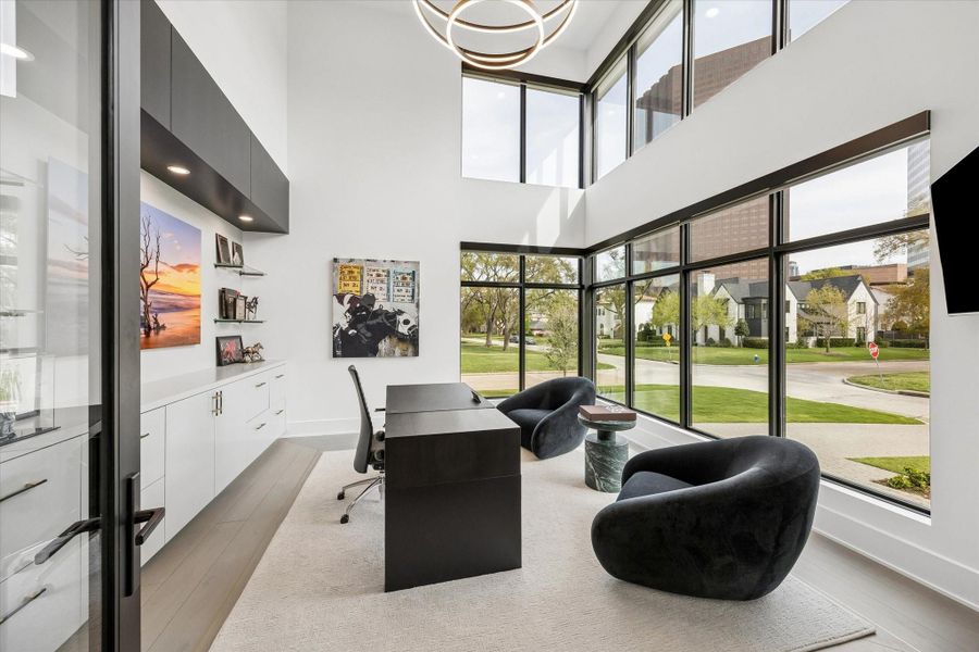 The study is on the corner of the home and has 1.5 story ceilings and brass inlays in the floor. The study is on the corner of the home and has 1.5 story ceilings and brass inlays in the floor.