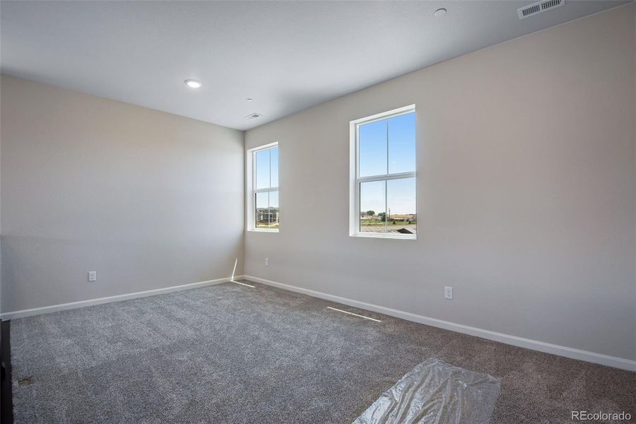 Spacious, unfurnished interior of a new home in Reunion Ridge, Commerce City (Image 31).