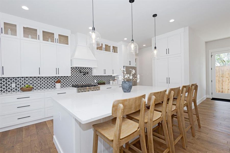 Clean lines and Premium Finishes bring this kitchen to life! There is plenty of prep space, storage and style in every corner. Clean lines and Premium Finishes bring this kitchen to life! There is plenty of prep space, storage and style in every corner.