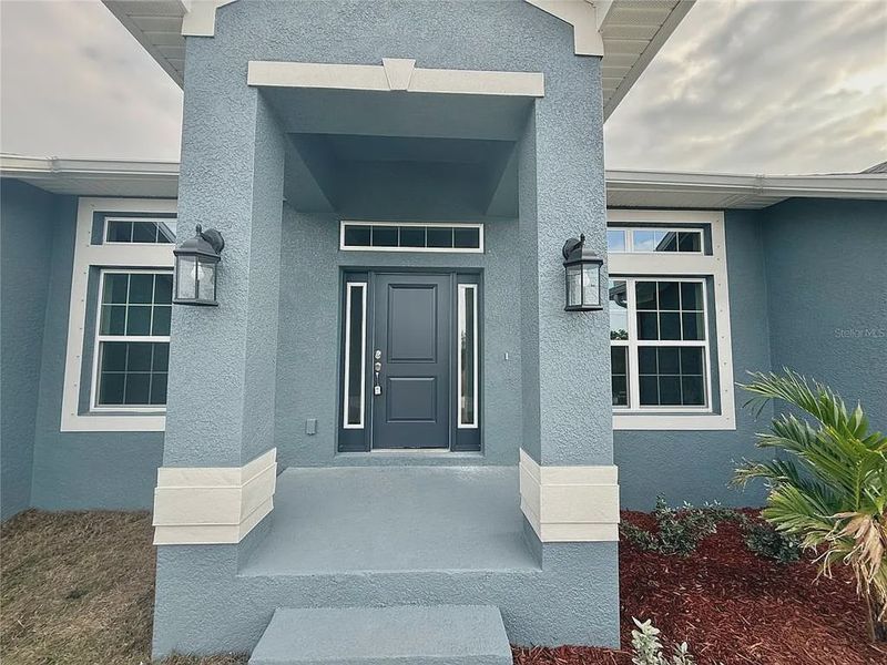 Exterior details and patio area of a home in South Gulf Cove, Port Charlotte (Image 3). Exterior details and patio area of a home in South Gulf Cove, Port Charlotte (Image 3).