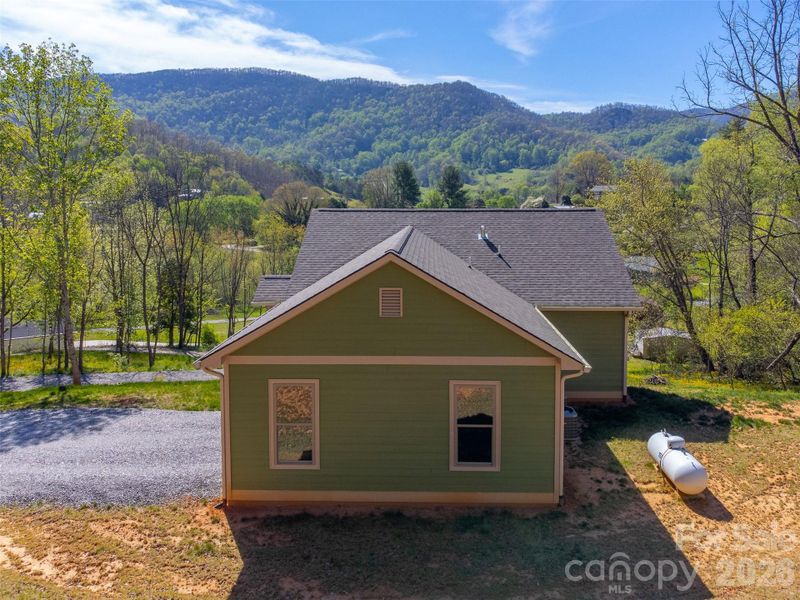 Exterior details and patio area of a home in , Waynesville (Image 31).