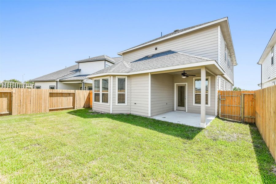 Front exterior of a new home in Anderson Lakes, Houston, TX, highlighting curb appeal (Image 25). Front exterior of a new home in Anderson Lakes, Houston, TX, highlighting curb appeal (Image 25).
