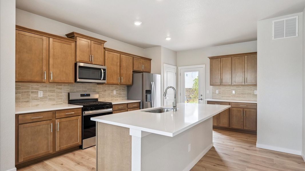 Furnished interior view inside a new home in Sky Ranch, Watkins (Image 4).
