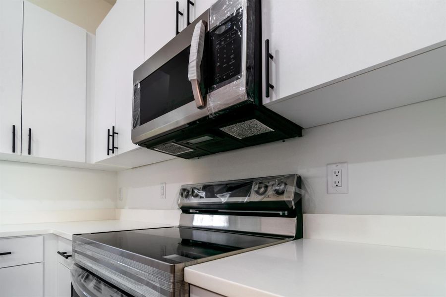 Furnished interior view inside a new home in , Port Charlotte (Image 2). Furnished interior view inside a new home in , Port Charlotte (Image 2).