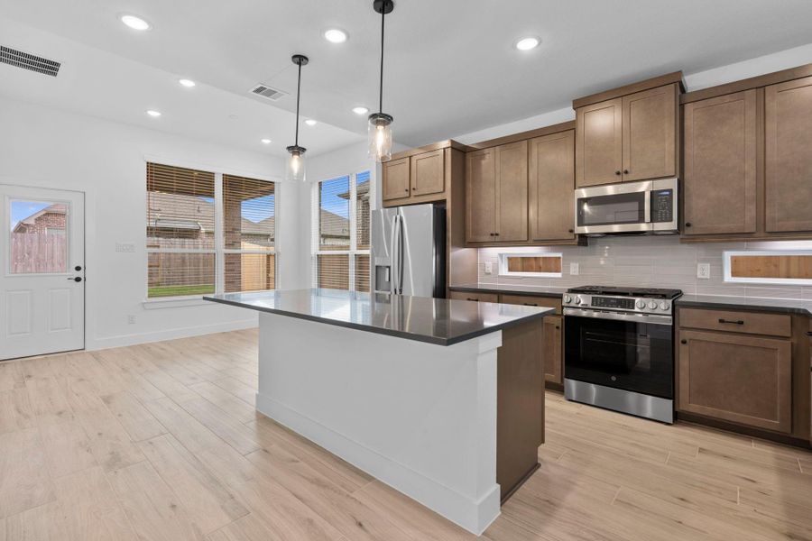 Furnished interior view inside a new home in Wood Leaf Reserve, Tomball (Image 9).