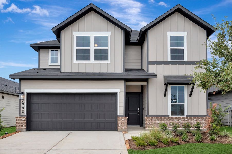 Front exterior of a new home in Mason Woods, Cypress, TX, highlighting curb appeal (Image 20).