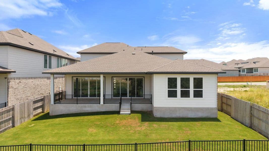Exterior details and patio area of a home in Lariat, Liberty Hill (Image 27).