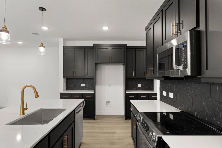 Kitchen featuring the Noir Collection Kitchen featuring the Noir Collection