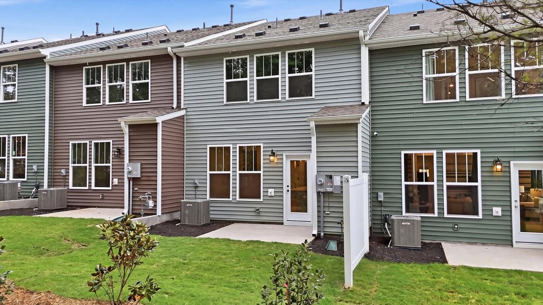 Superior curb appeal continues to the back with a refined, patio and private backyard located in Simpsonville, SC