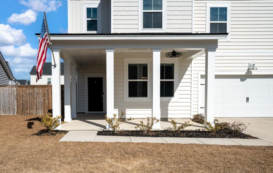 Exterior details and patio area of a home in Sweetgrass at Summers Corner, Summerville (Image 30).