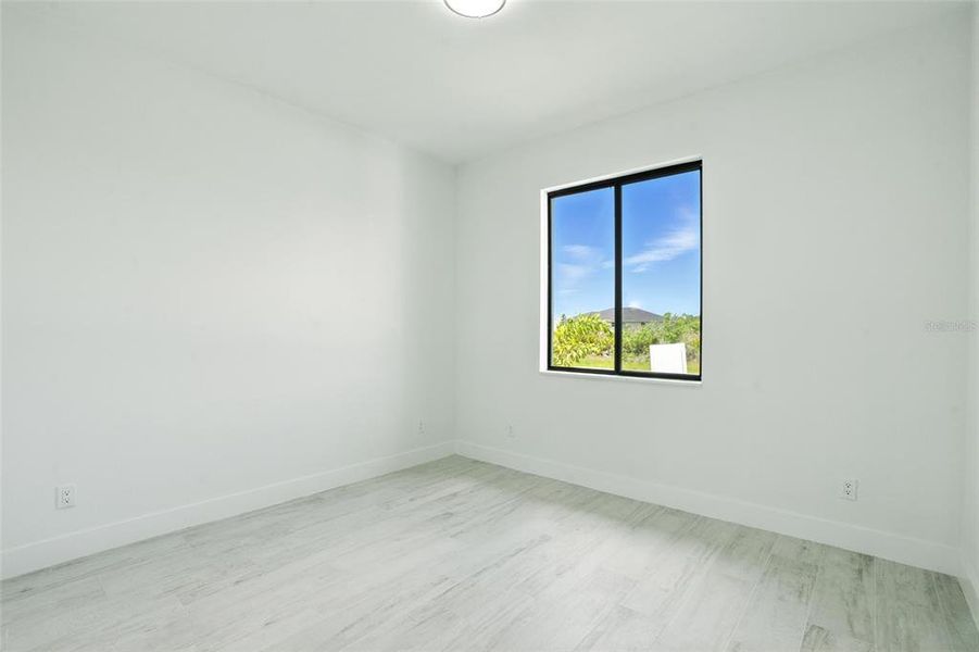 Spacious, unfurnished interior of a new home in , Port Charlotte (Image 39).