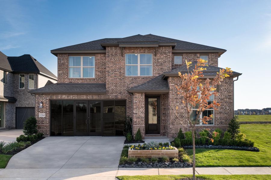 Representative exterior photo of a completed home built from the Sage by Tri Pointe Homes in Union Park, Little Elm, TX (Image 16).