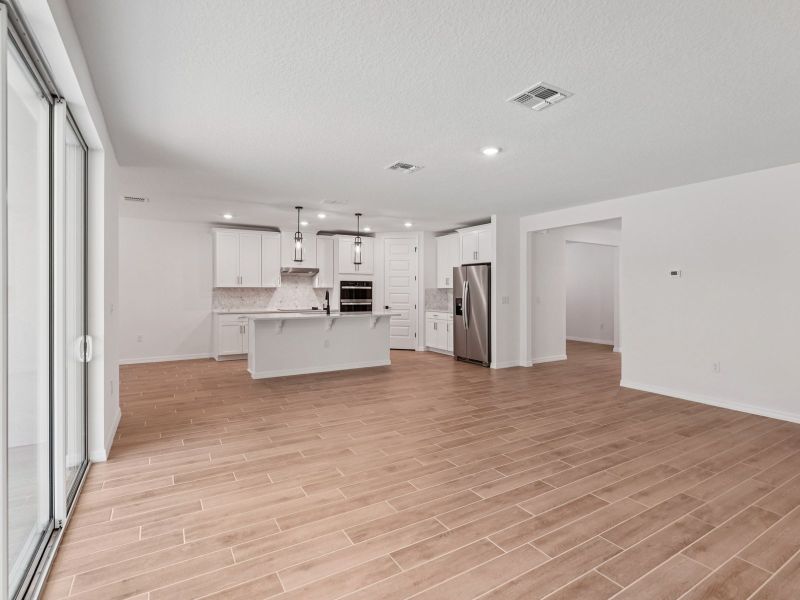 Spacious, unfurnished interior of a new home in Oakfield Trails - Signature Series, Parrish (Image 5). Spacious, unfurnished interior of a new home in Oakfield Trails - Signature Series, Parrish (Image 5).