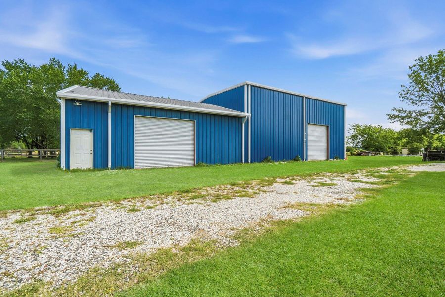 Impressive 100 x 50 metal building featuring durable steel framing, two roll-up doors & soaring 16–20 ft ceilings. Equipped with a bathroom, plumbing & 240V breaker box, making it ideal for a workshop, business operation, equipment storage or hobby space.