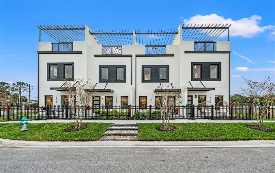 Front exterior of a new home in , Pinellas Park, FL, highlighting curb appeal (Image 1).