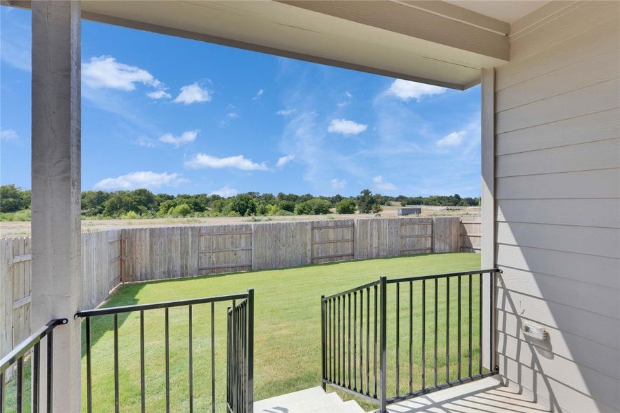 View of fenced backyard