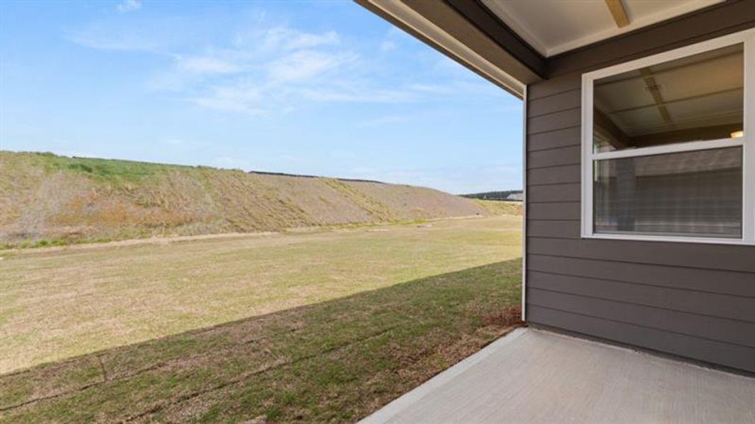 Exterior details and patio area of a home in Hamptons at Riverwood North, Dallas (Image 51).