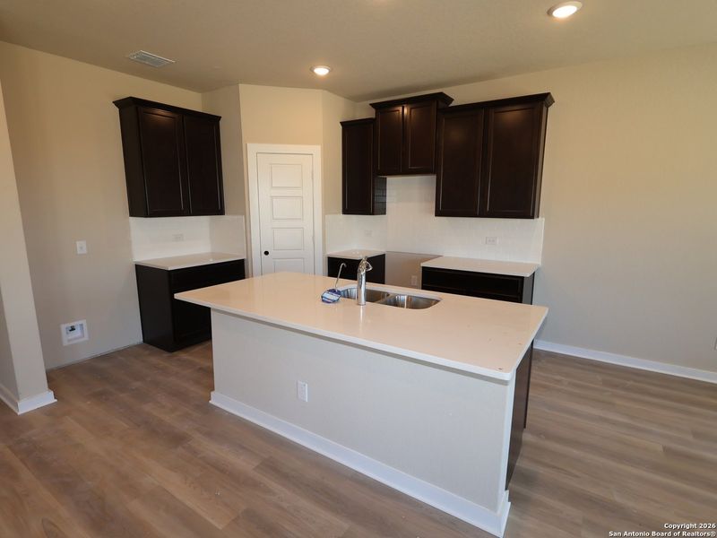 Furnished interior view inside a new home in Winding Brook, San Antonio (Image 12).