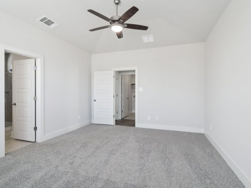Primary suite in the San Saba floorplan at a Meritage Homes community.