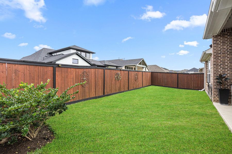 Exterior details and patio area of a home in , Tomball (Image 25).